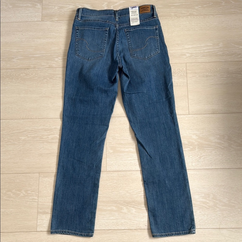 3/$10 Levi's Blue Mid Rise Slim Jeans - Picture 3 of 10